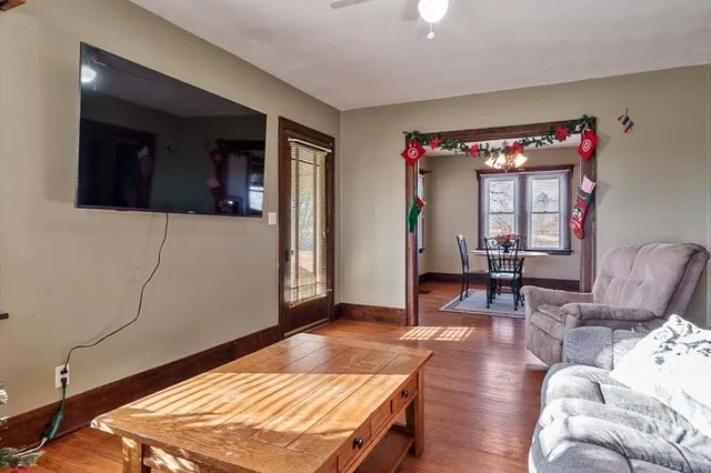 a living room with furniture and a rug