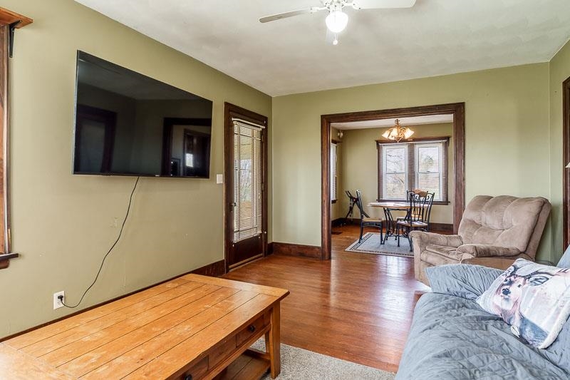 16905 West State Road Pecatonica, IL 61063 - Photo 9 of 47 a living room with furniture and wooden floor