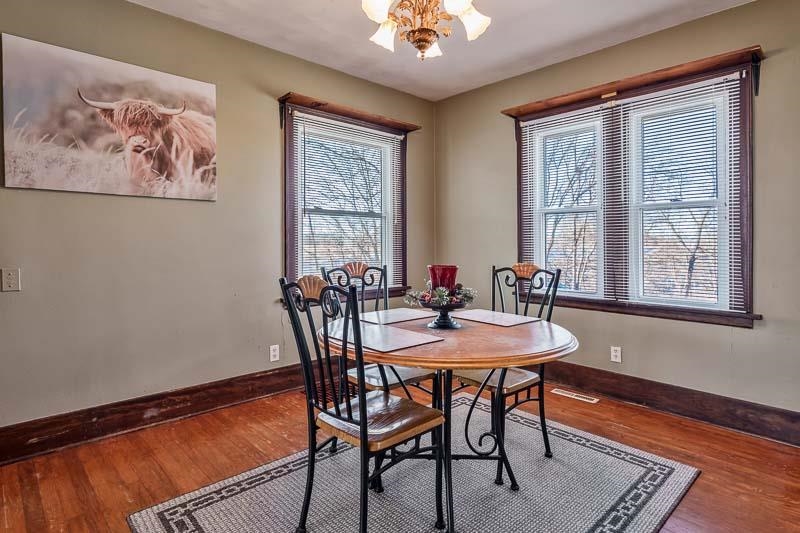 16905 West State Road Pecatonica, IL 61063 - Photo 10 of 36 a view of a dining room with furniture window and wooden floor