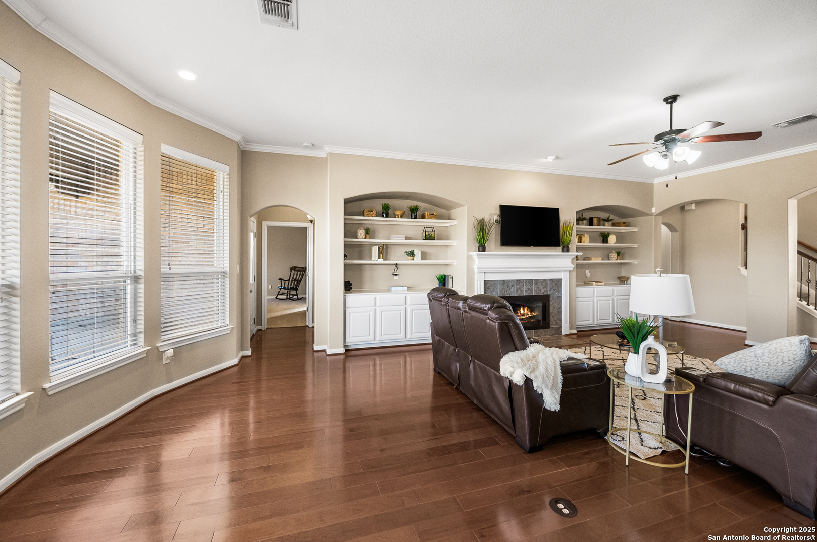 123 Dodder Lane Spring Branch, TX 78070 - Photo 11 of 72 a living room with furniture a fireplace and a flat screen tv
