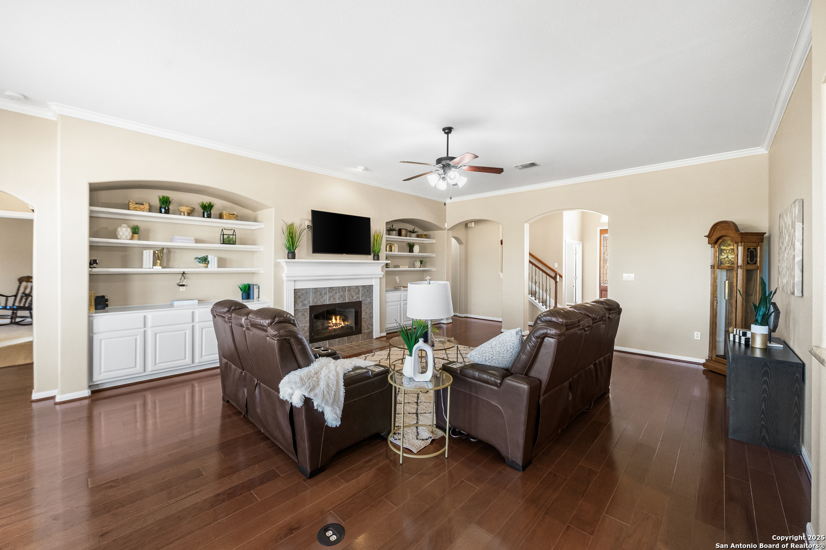 123 Dodder Lane Spring Branch, TX 78070 - Photo 12 of 72 a living room with furniture fireplace and a flat screen tv