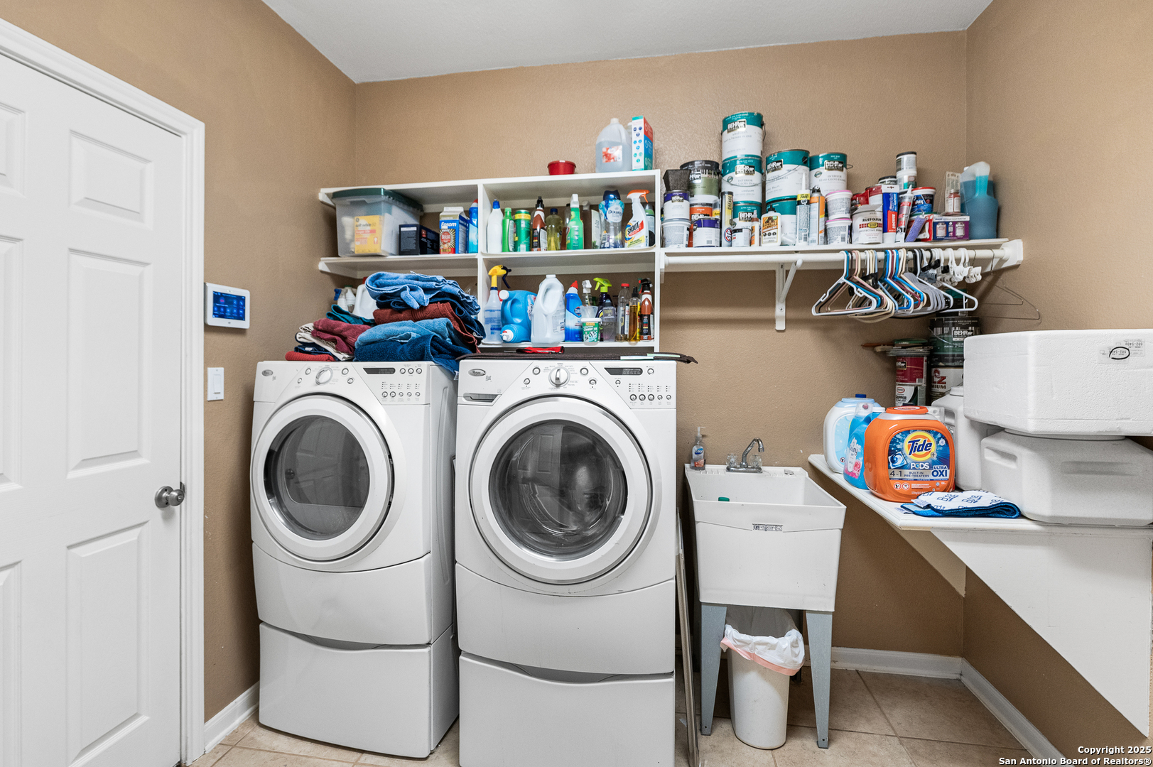 123 Dodder Lane Spring Branch, TX 78070 - Photo 38 of 72 a utility room with dryer and washer