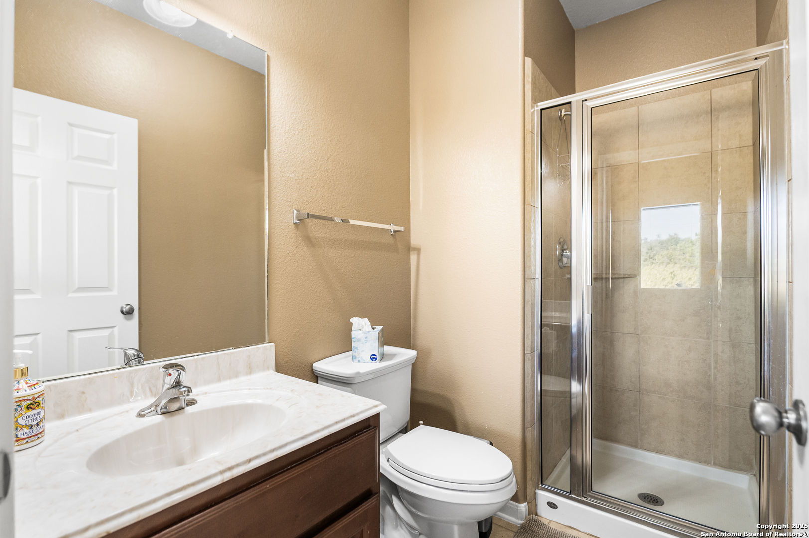 123 Dodder Lane Spring Branch, TX 78070 - Photo 39 of 72 a bathroom with a sink a toilet and shower