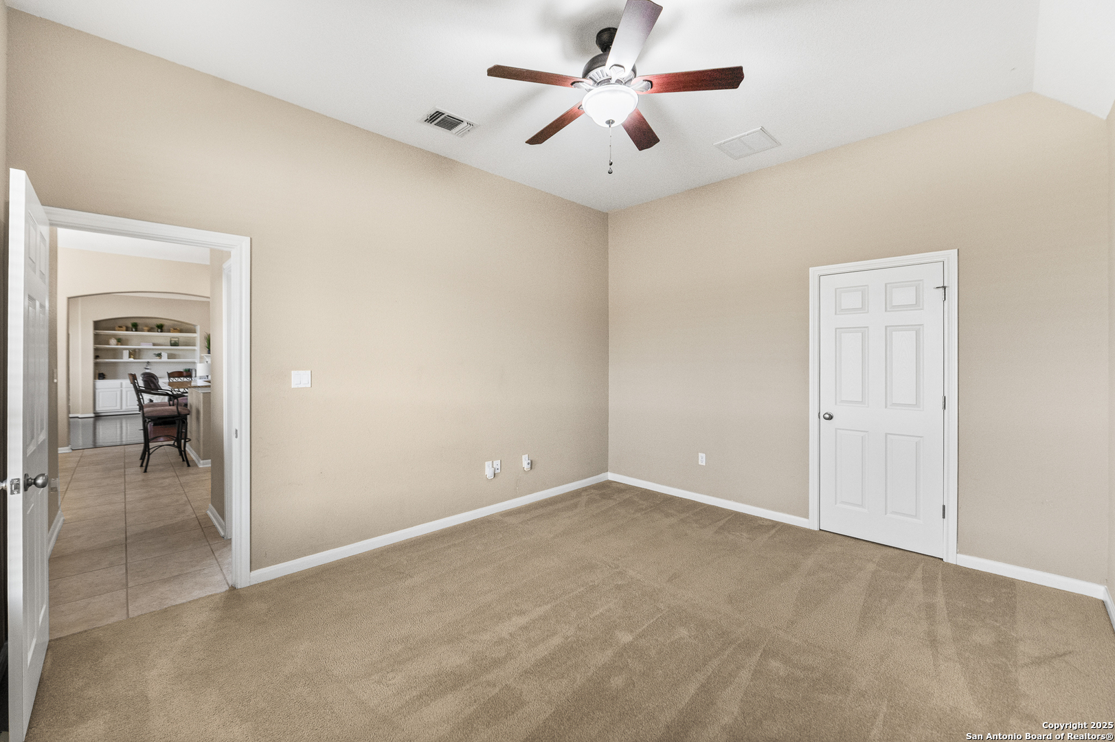 123 Dodder Lane Spring Branch, TX 78070 - Photo 40 of 72 a view of a big room with wooden floor and a chandelier fan