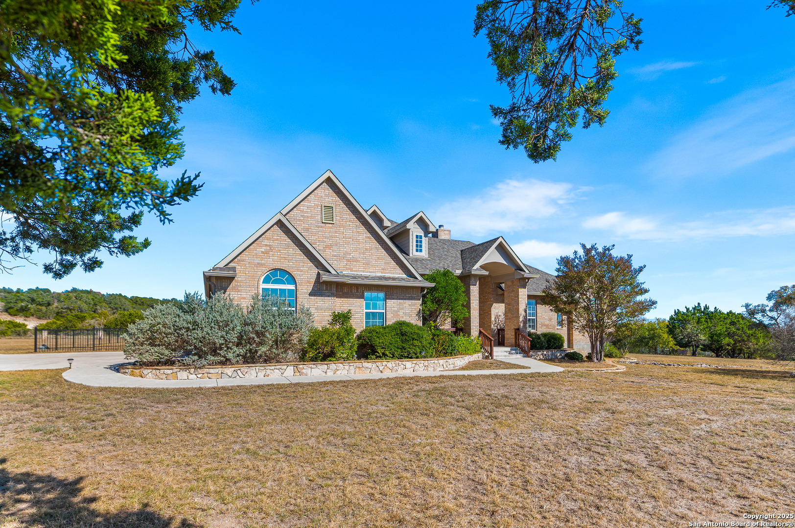 123 Dodder Lane Spring Branch, TX 78070 - Photo 4 of 72 front view of a house with a yard