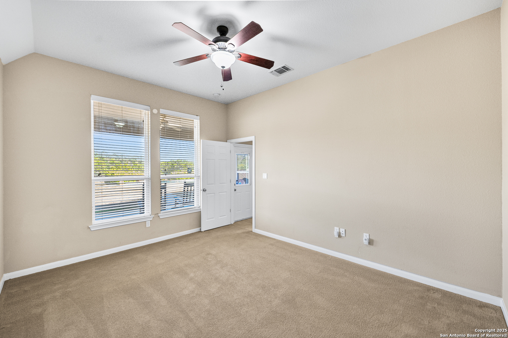 123 Dodder Lane Spring Branch, TX 78070 - Photo 41 of 72 a view of an empty room with a window