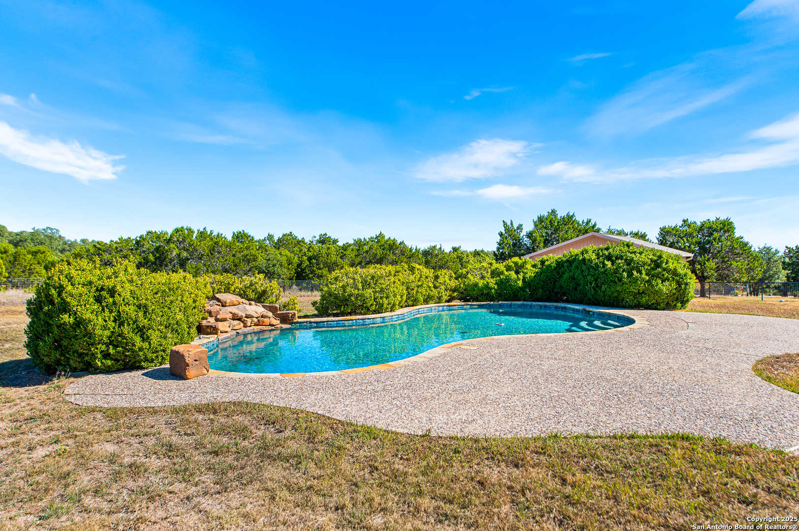 123 Dodder Lane Spring Branch, TX 78070 - Photo 50 of 72 a view of a lake with a big yard