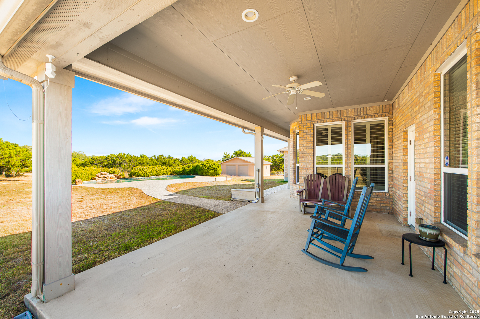 123 Dodder Lane Spring Branch, TX 78070 - Photo 52 of 72 a view of swimming pool with seating area