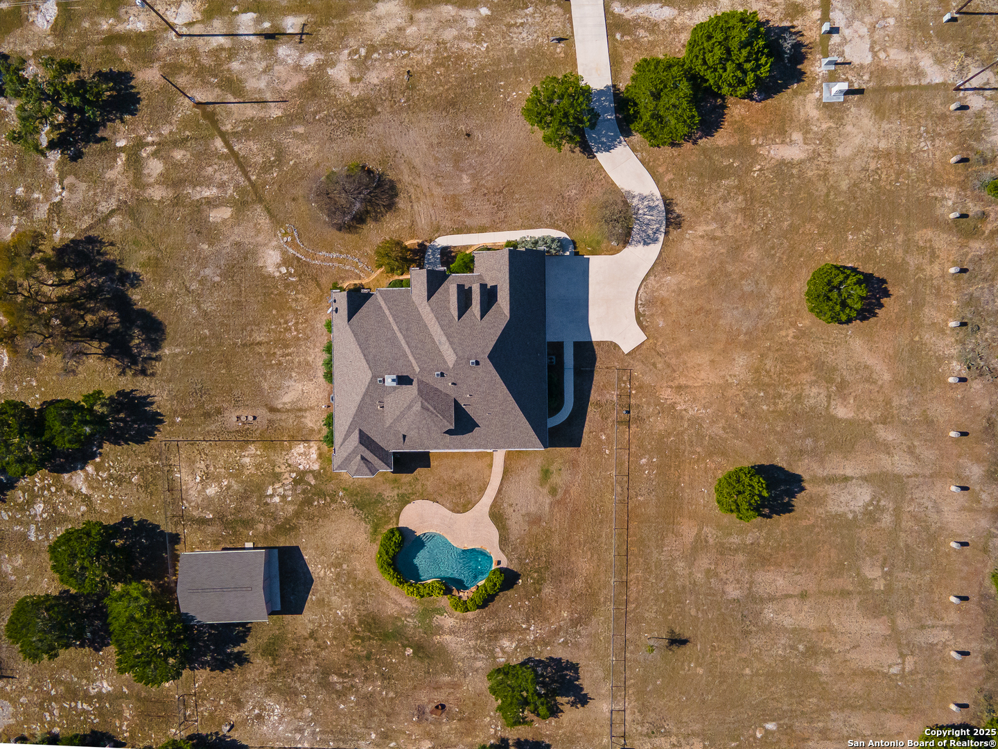 123 Dodder Lane Spring Branch, TX 78070 - Photo 67 of 72 an aerial view of house with a yard