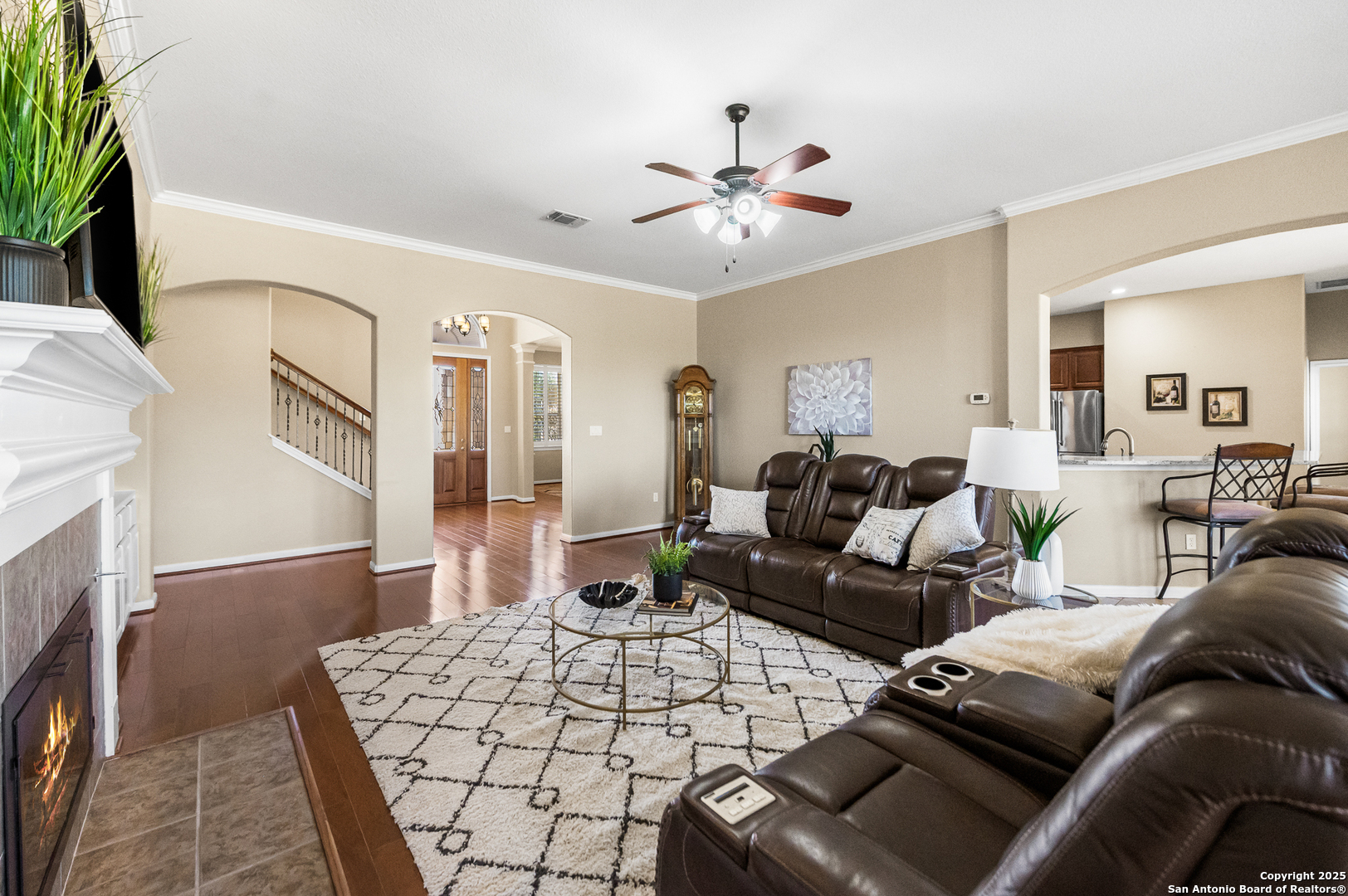 123 Dodder Lane Spring Branch, TX 78070 - Photo 8 of 72 a living room with furniture and a fireplace