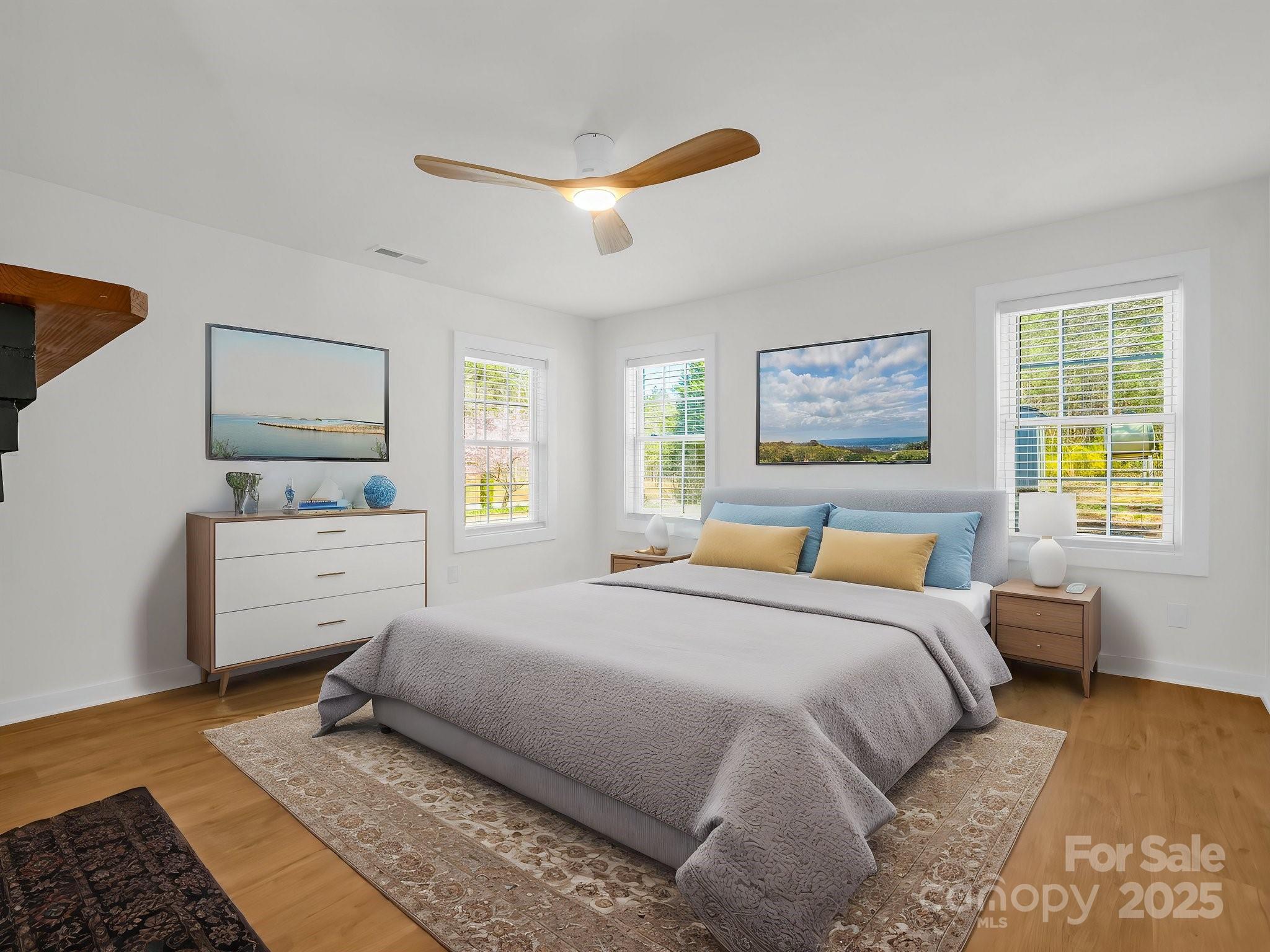 3531 Big Level Road Mill Spring, NC 28756 - Photo 11 of 29 a bed room with a bed and a window