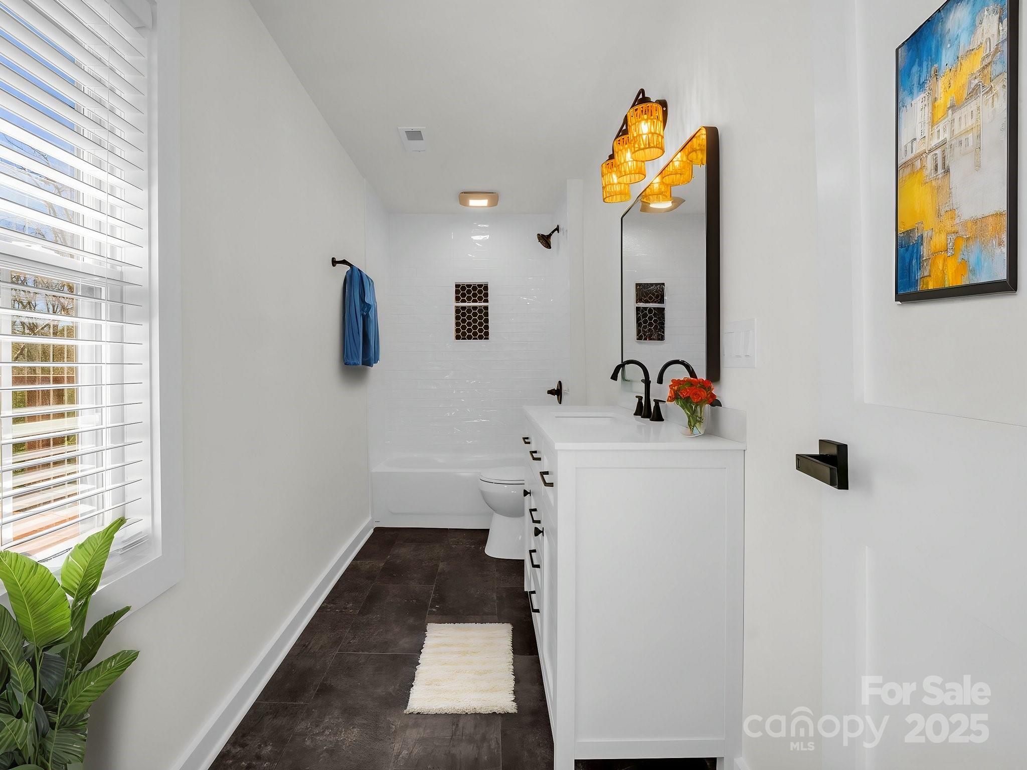 3531 Big Level Road Mill Spring, NC 28756 - Photo 12 of 29 a bathroom with a sink and a mirror