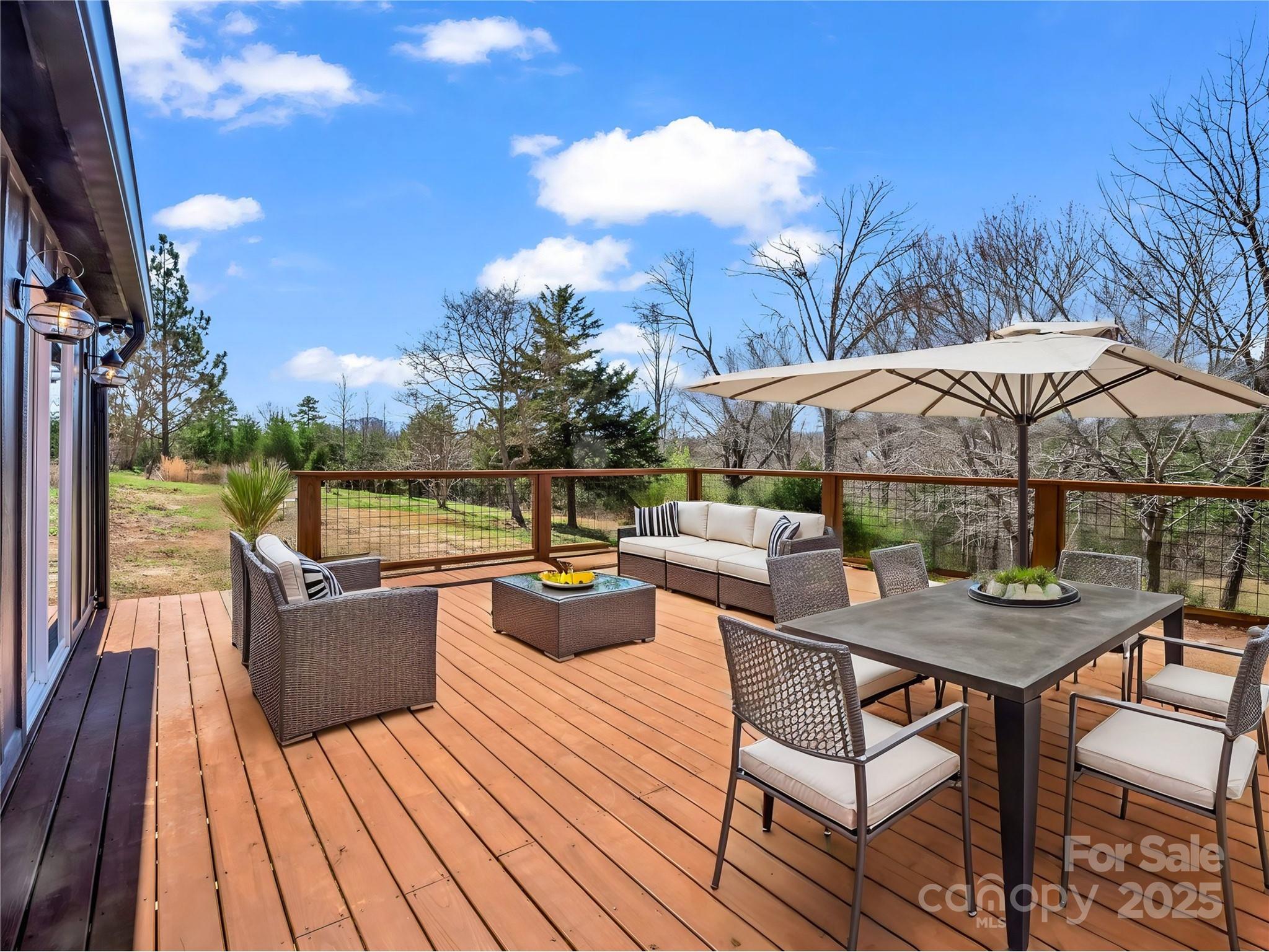 3531 Big Level Road Mill Spring, NC 28756 - Photo 14 of 29 a view of deck with patio