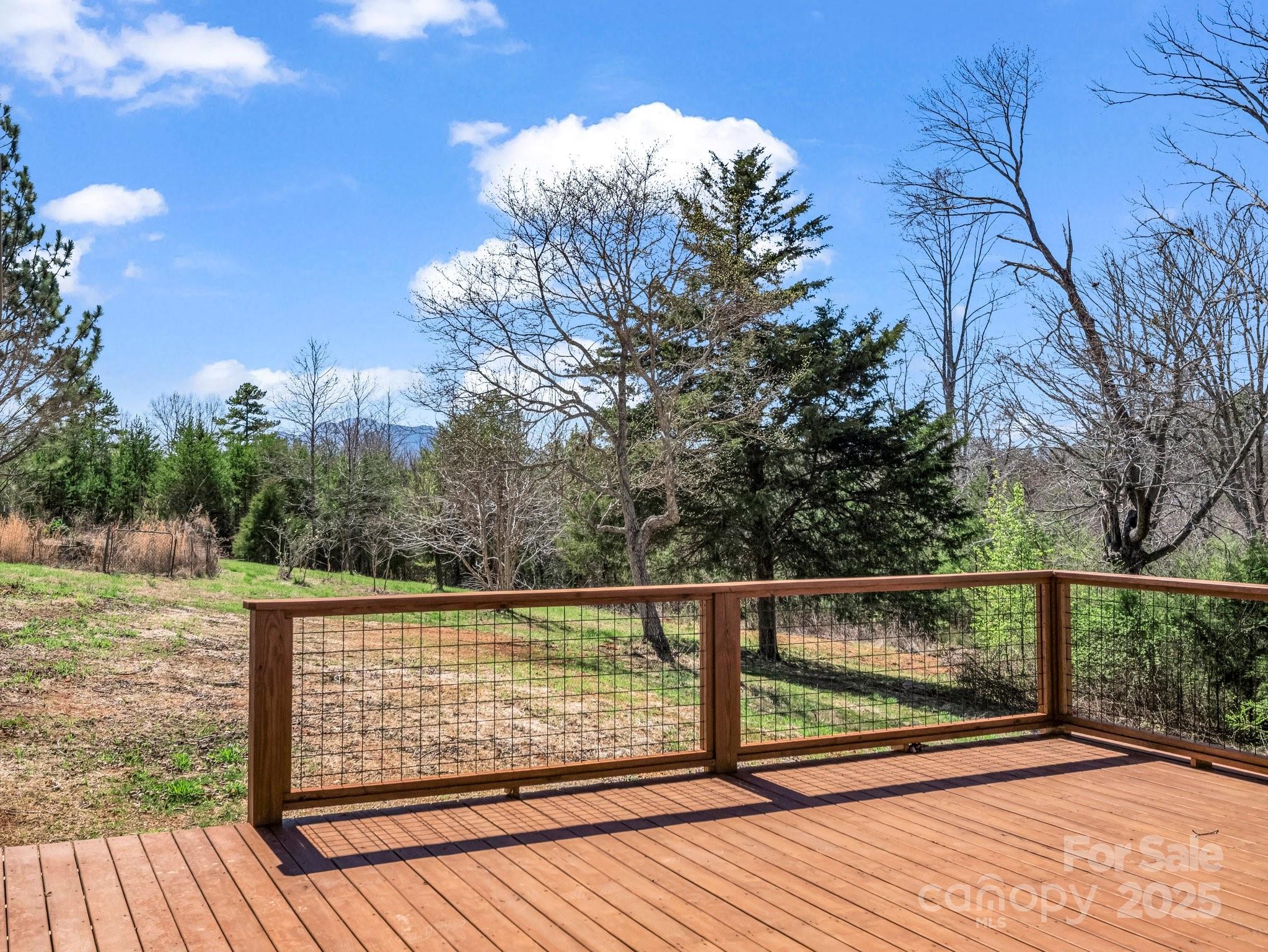 3531 Big Level Road Mill Spring, NC 28756 - Photo 15 of 29 a view of balcony with wooden floor