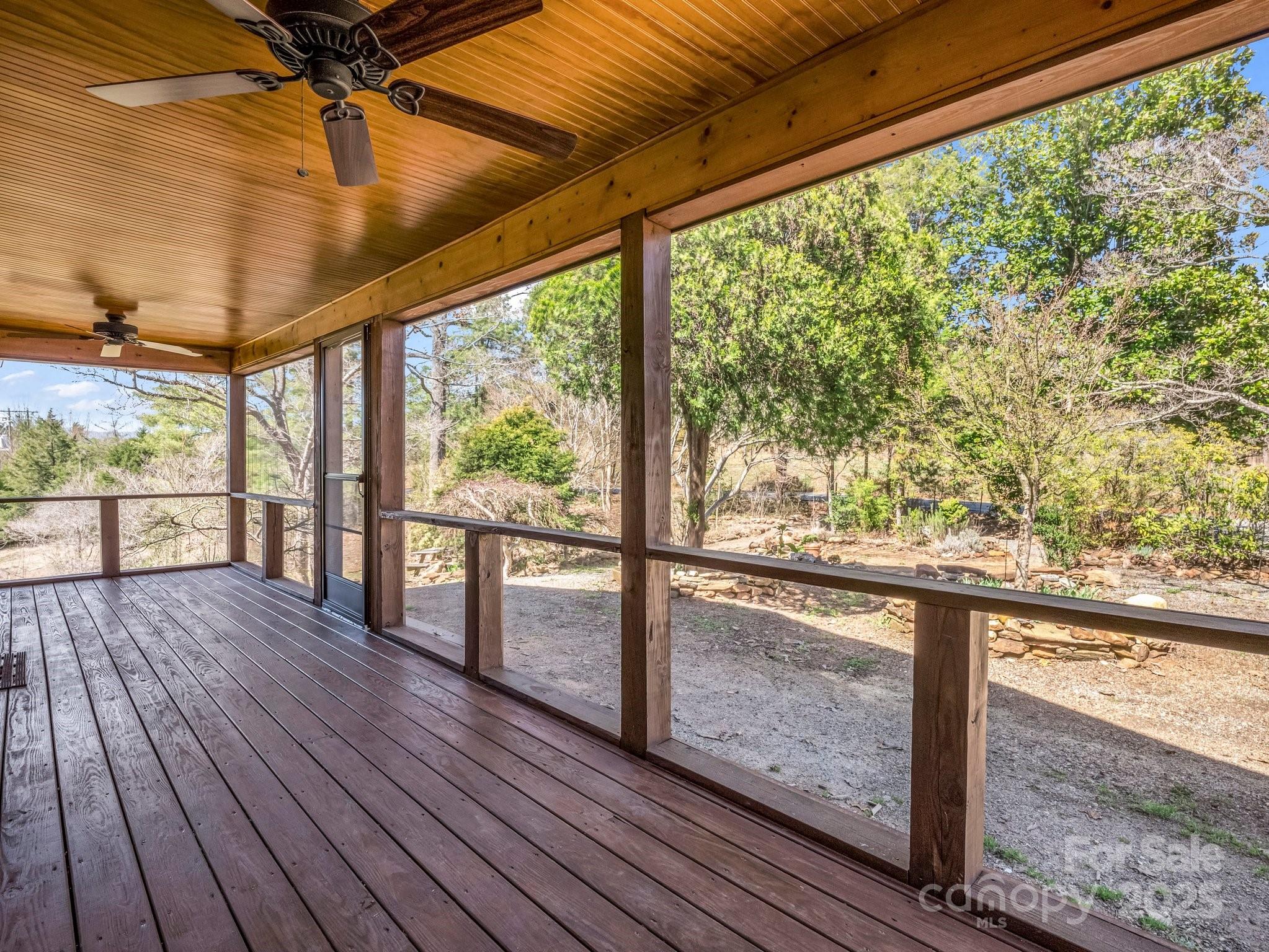 3531 Big Level Road Mill Spring, NC 28756 - Photo 17 of 29 a view of outdoor space with wooden floor and outdoor space