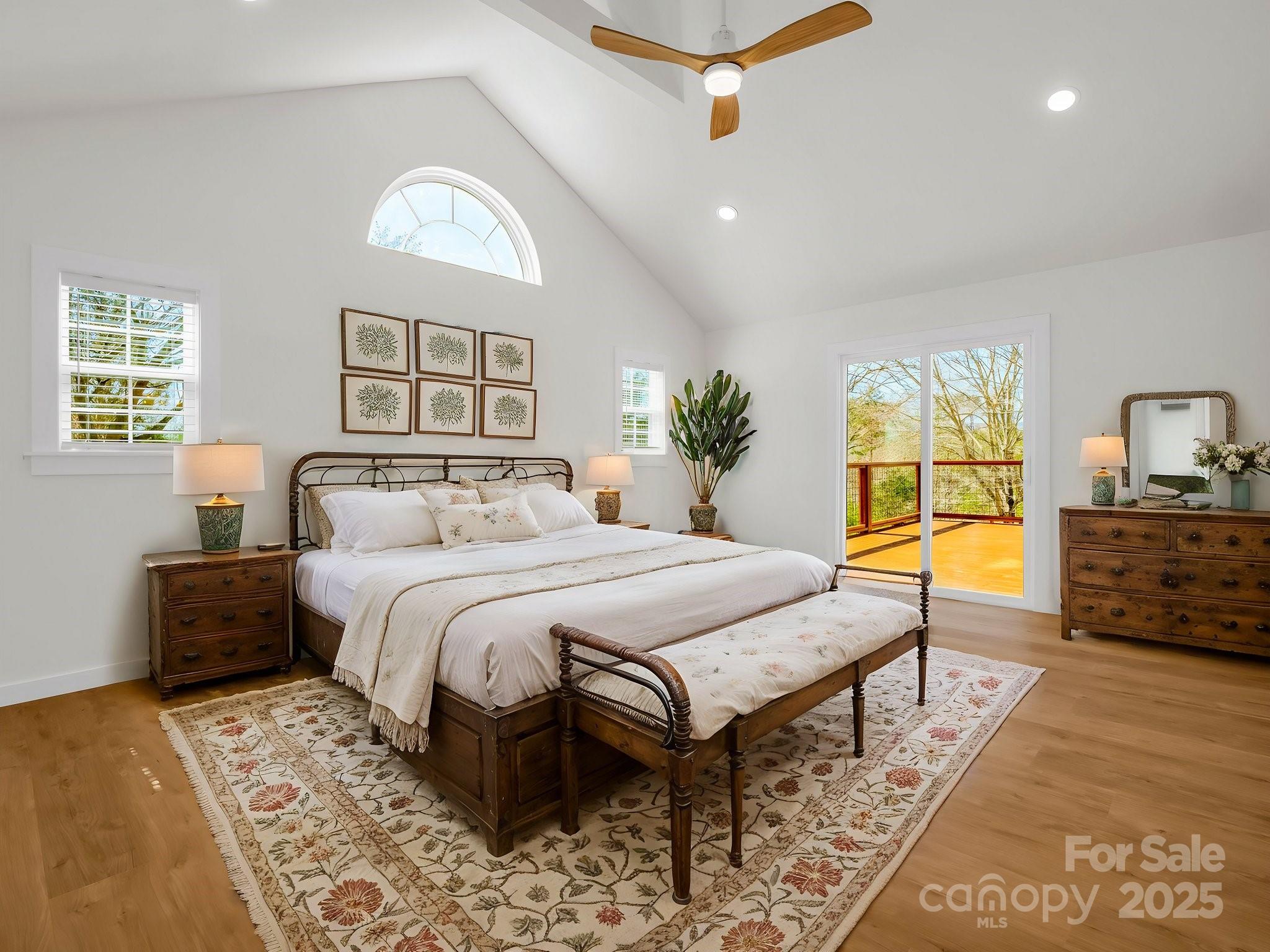 3531 Big Level Road Mill Spring, NC 28756 - Photo 8 of 29 a bedroom with a bed and wooden floor