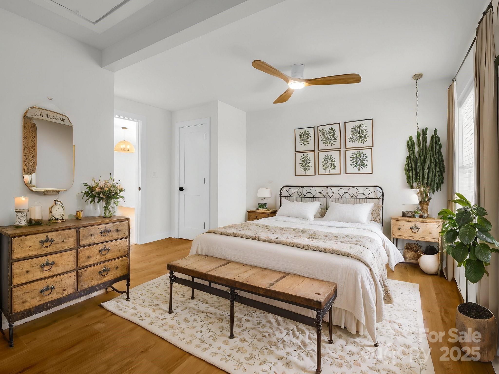 3531 Big Level Road Mill Spring, NC 28756 - Photo 10 of 29 a bedroom with a bed and a dresser
