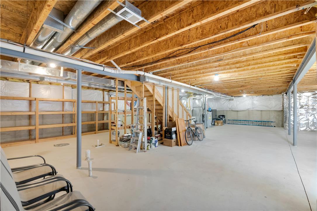 1709 Travers Road Breinigsville, PA 18031 - Photo 46 of 55 A spacious unfinished basement awaits your personal touch, ready for future expansion and customization.