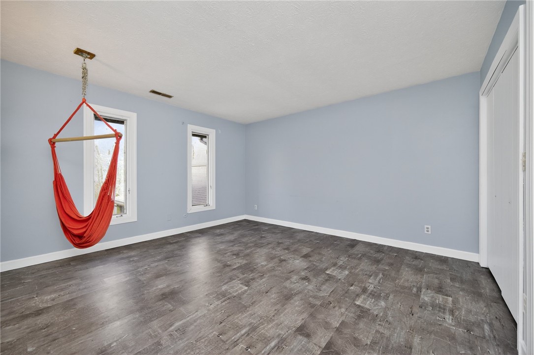 4747 Fawnwood Road Dayton, OH 45429 - Photo 37 of 58 This bright room features durable flooring, offering a versatile space for diverse arrangements.