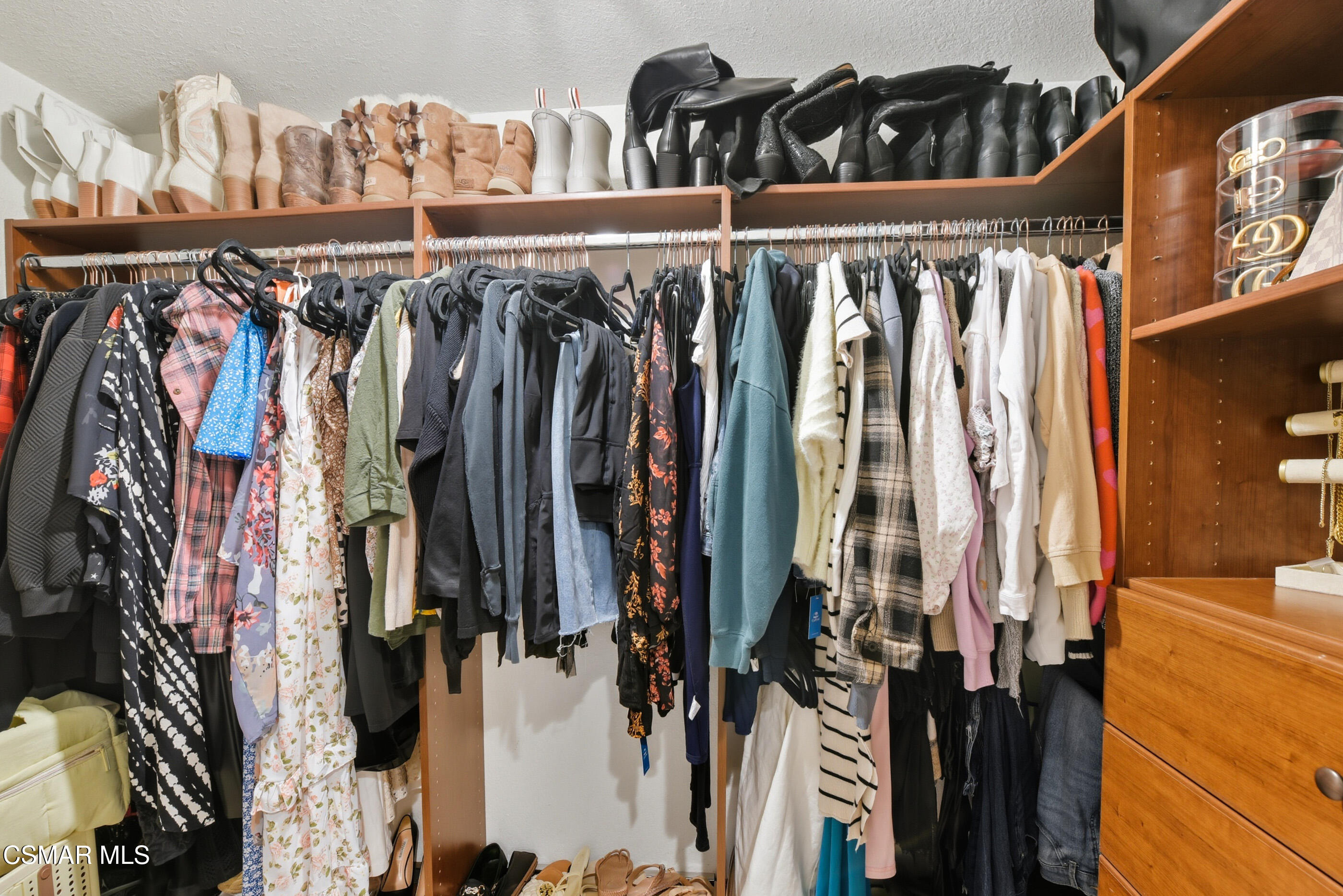 5474 Geoffrey Avenue Simi Valley, CA 93063 - Photo 26 of 38 a view of walk in closet with clothes and shoes