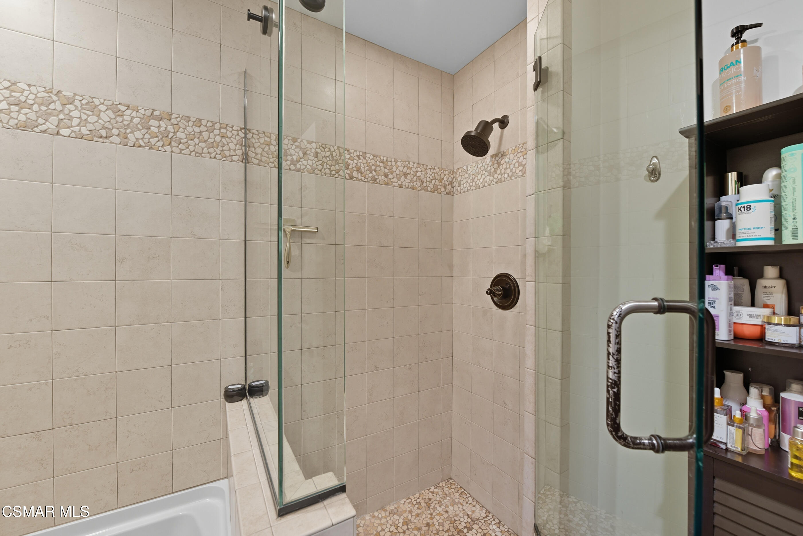 5474 Geoffrey Avenue Simi Valley, CA 93063 - Photo 29 of 38 a bathroom with a tub