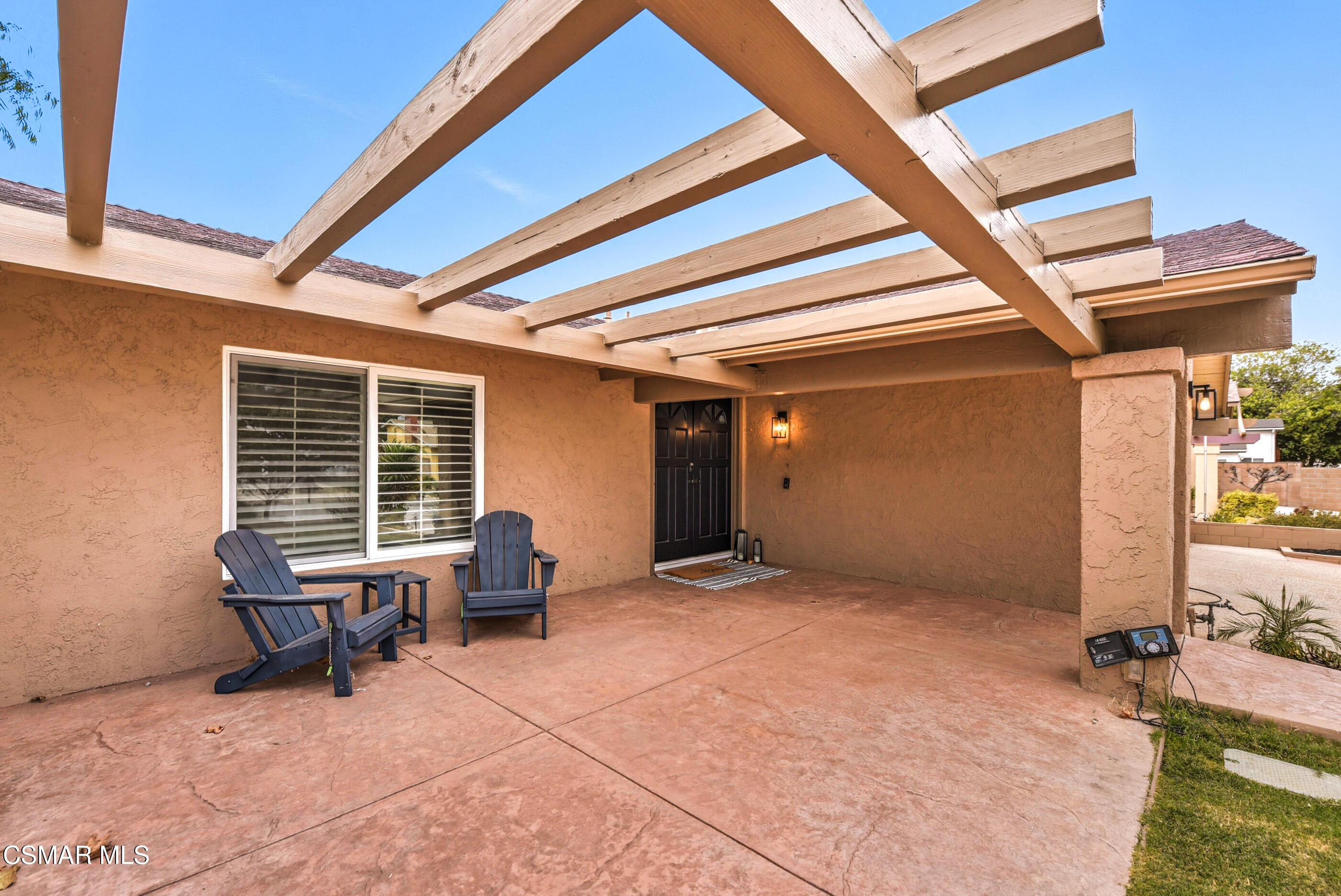 5474 Geoffrey Avenue Simi Valley, CA 93063 - Photo 3 of 38 a view of an empty room with chair and tables
