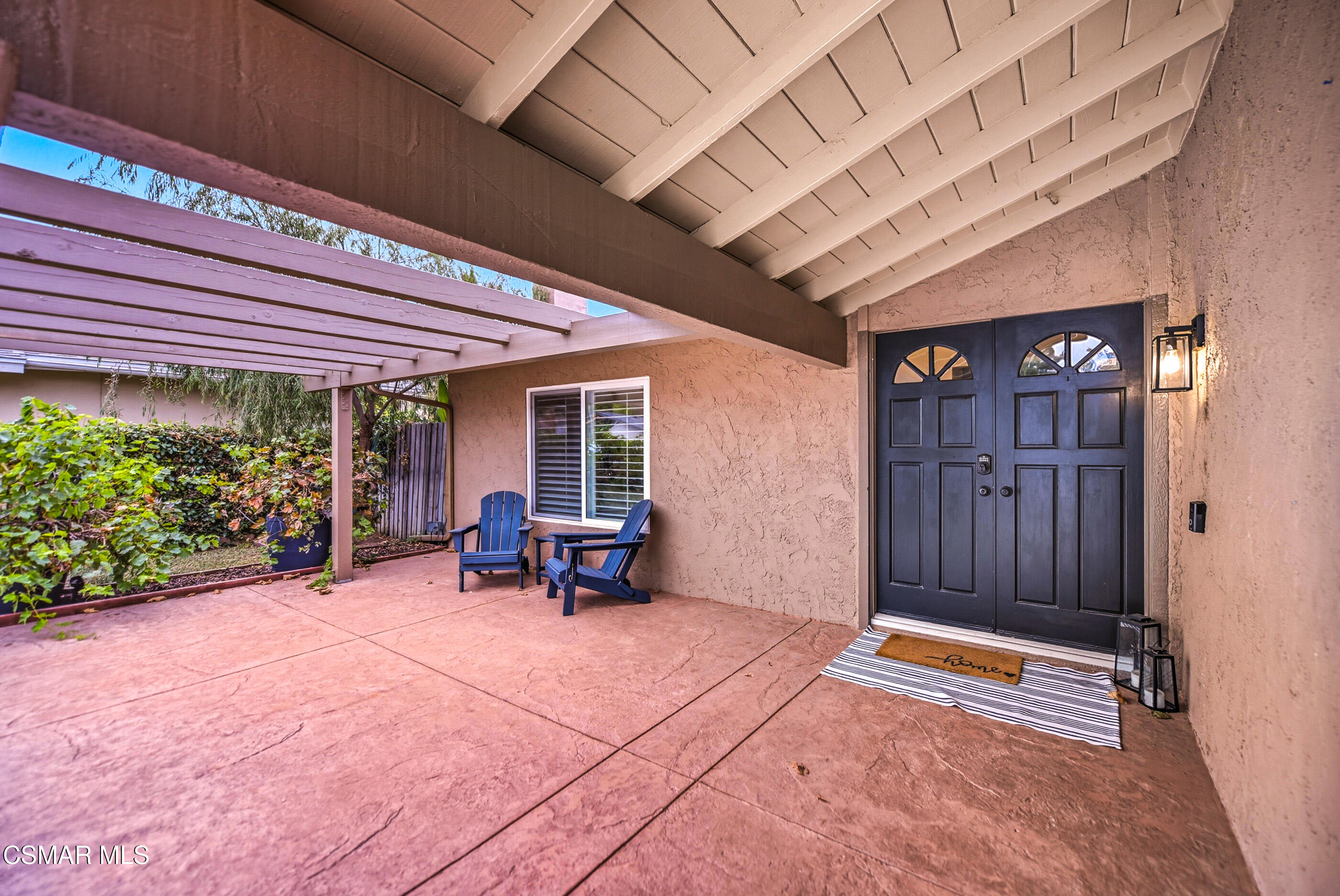 5474 Geoffrey Avenue Simi Valley, CA 93063 - Photo 4 of 38 a view of a room with chairs and a barbeque