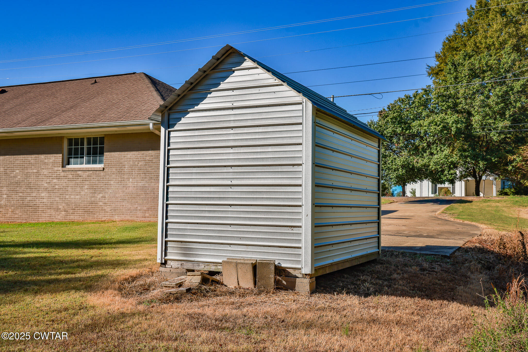 707 North Main Street Dyer, TN 38330 - Photo 12 of 29 a view of a house with a yard
