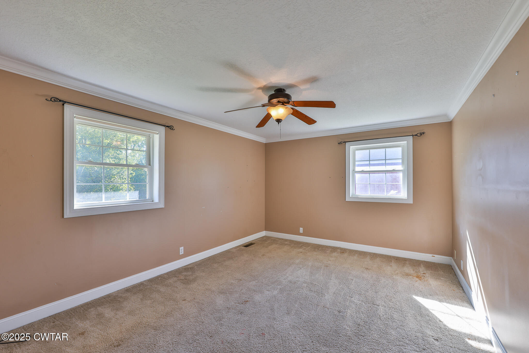 707 North Main Street Dyer, TN 38330 - Photo 18 of 29 a view of an empty room with a window