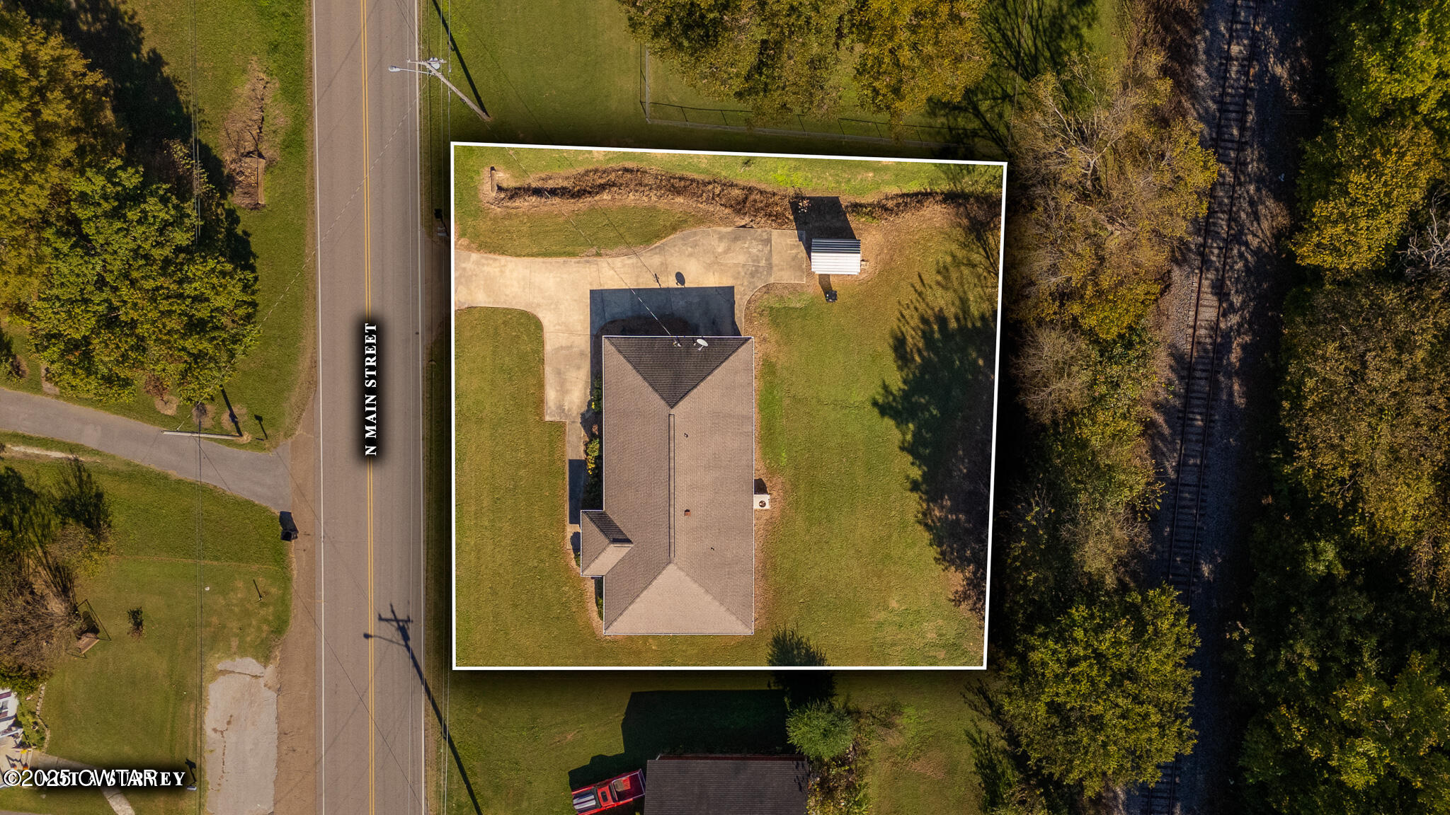 707 North Main Street Dyer, TN 38330 - Photo 2 of 29 view of a door with wooden door