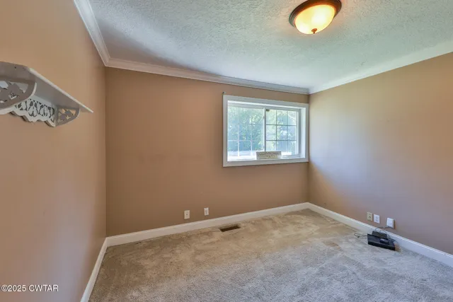 an empty room with window