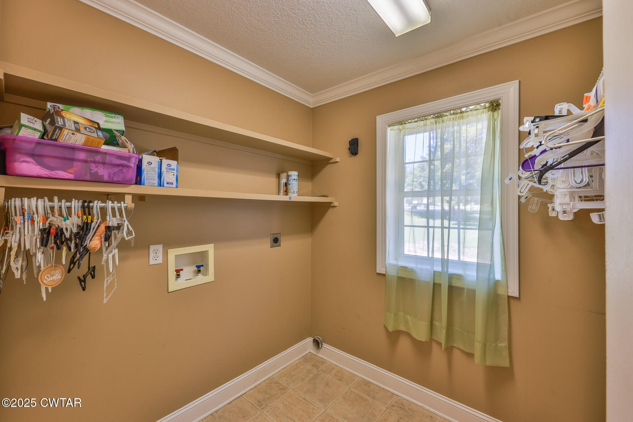 707 North Main Street Dyer, TN 38330 - Photo 27 of 29 a view of storage and utility room