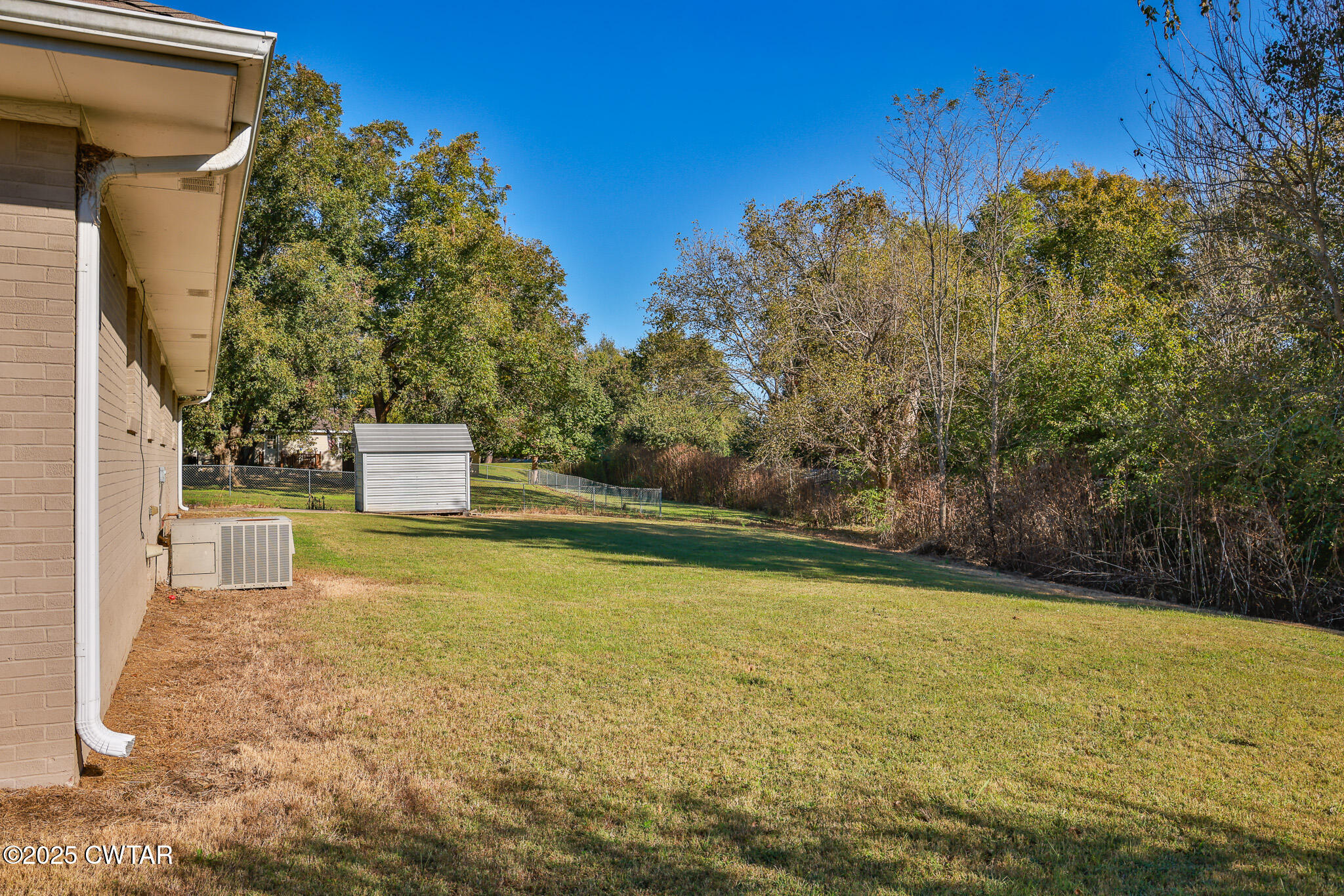 707 North Main Street Dyer, TN 38330 - Photo 9 of 29 a view of a back yard