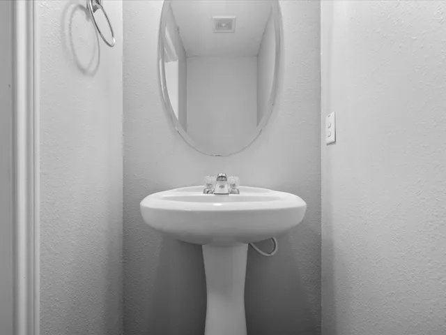 a sink with a mirror