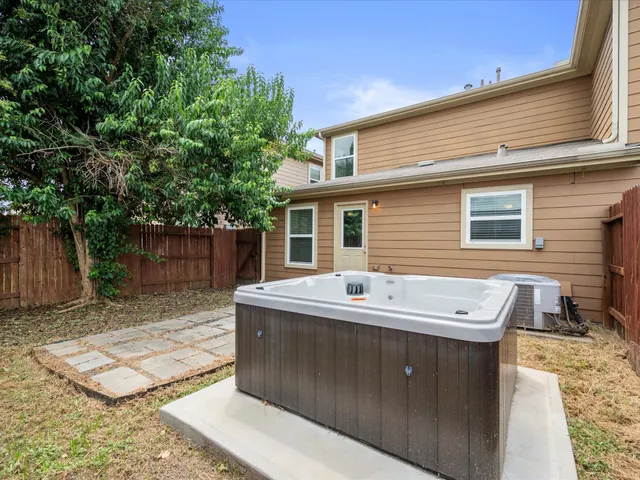 a backyard of a house with seating space