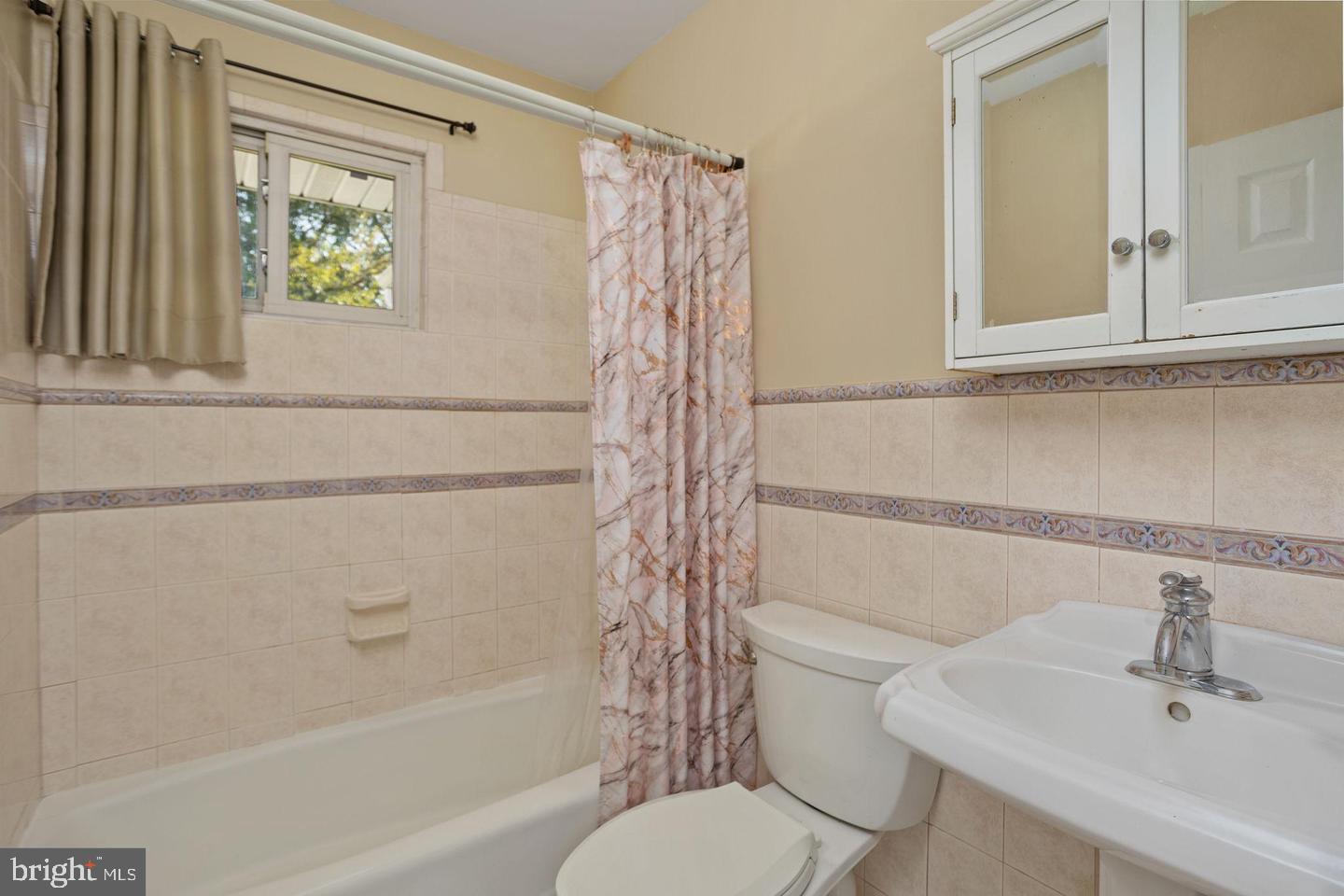 2 Great Oak Road Hamilton, NJ 08690 - Photo 7 of 15 a bathroom with a sink a toilet and shower