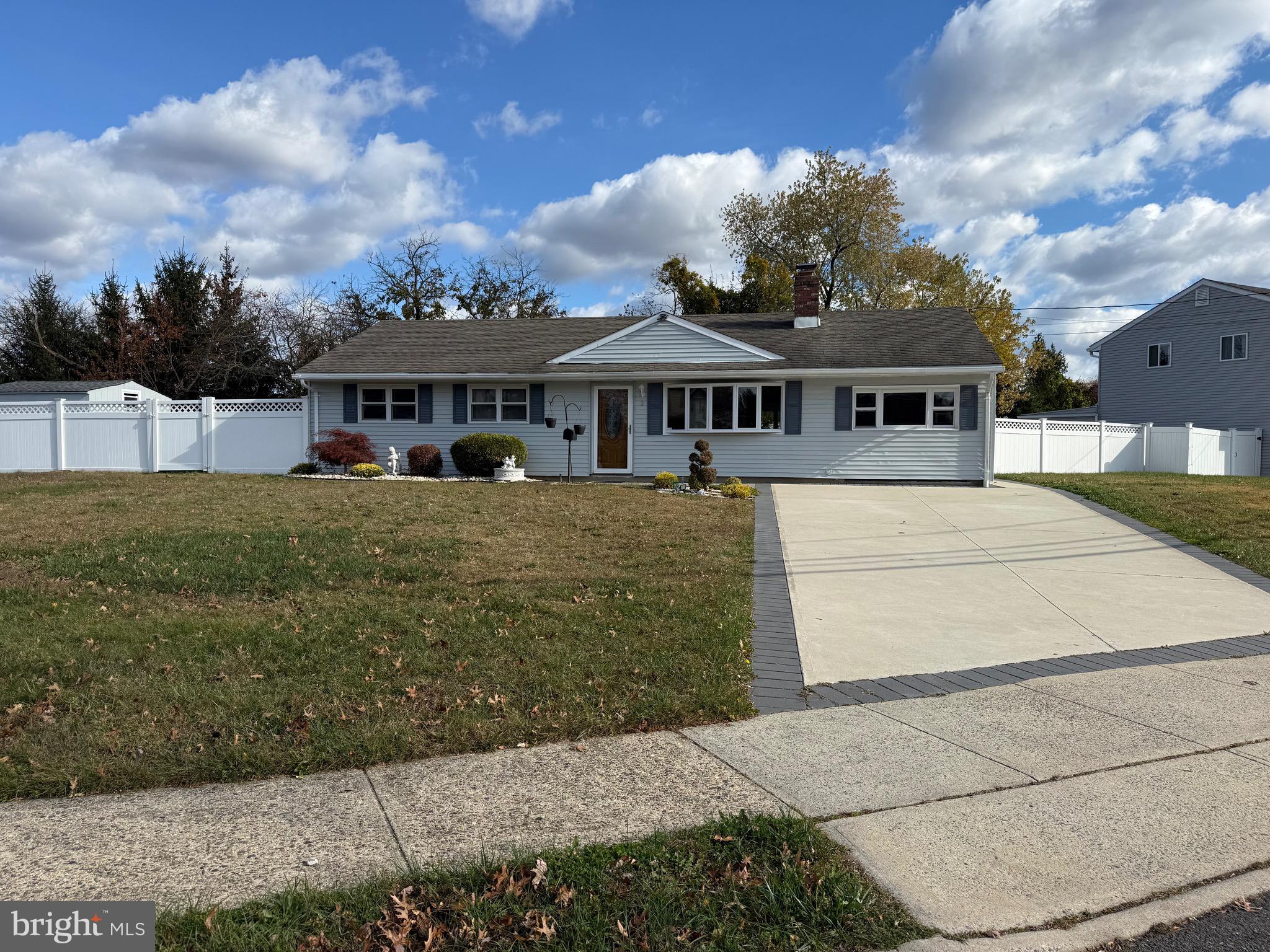 2 Great Oak Road Hamilton, NJ 08690 - Photo 9 of 15 a front view of a house with a garden