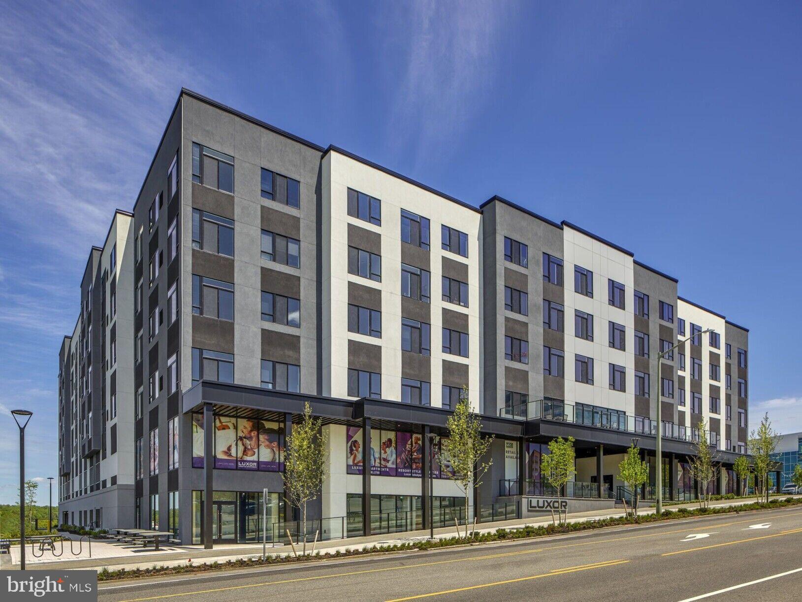 9 Presidential Boulevard, Unit 0B119 Bala Cynwyd, PA 19004 - Photo 19 of 20 a front view of a building with a street
