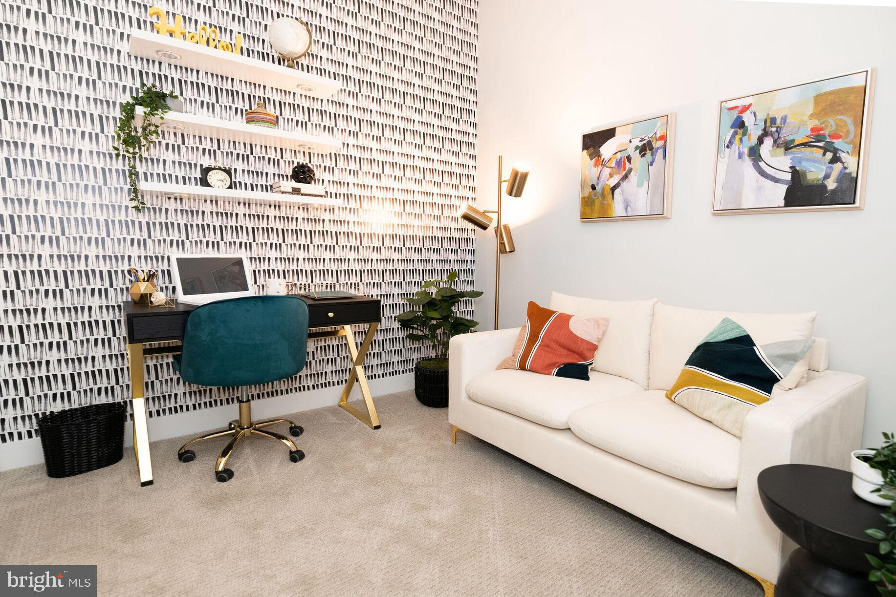 9 Presidential Boulevard, Unit 0B119 Bala Cynwyd, PA 19004 - Photo 7 of 20 a living room with furniture and a lamp