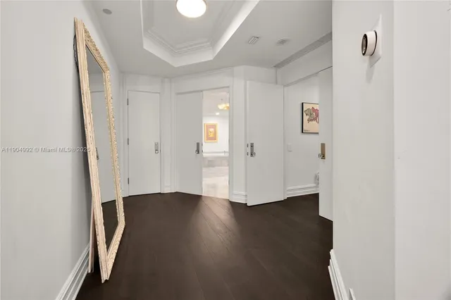 a spacious bedroom with a large bed and a couch