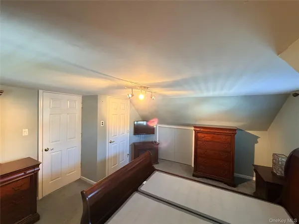 a view of a hallway with a couch