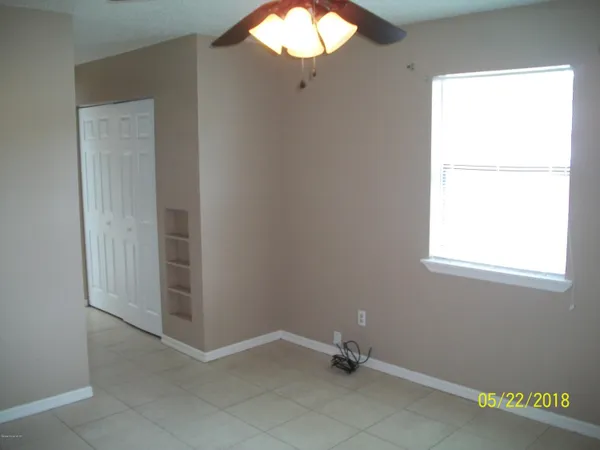 an empty room with window
