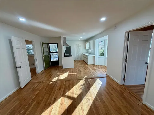 a bed room with a bed and mirror