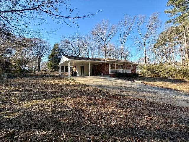 a view of house with a street