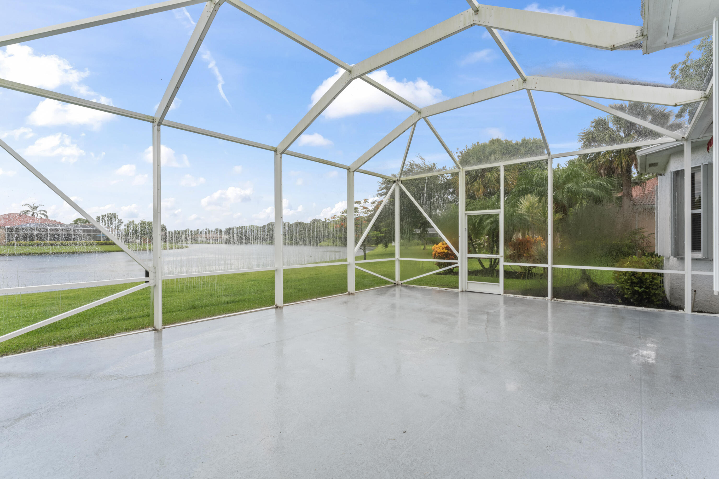 918 Southwest Blue Stem Way Stuart, FL 34997 - Photo 35 of 48 a view of a backyard