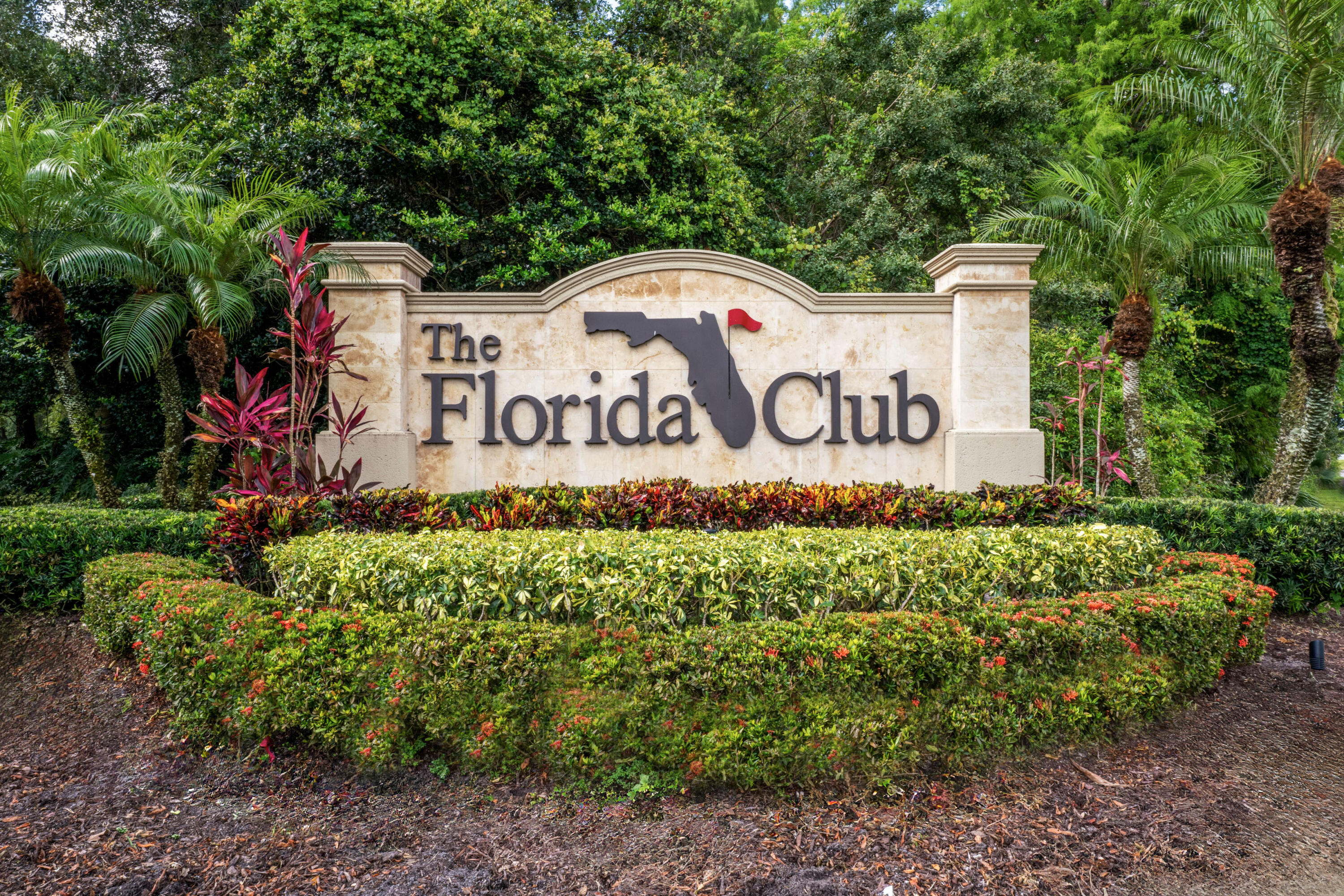 918 Southwest Blue Stem Way Stuart, FL 34997 - Photo 47 of 48 a sign on the side of the road