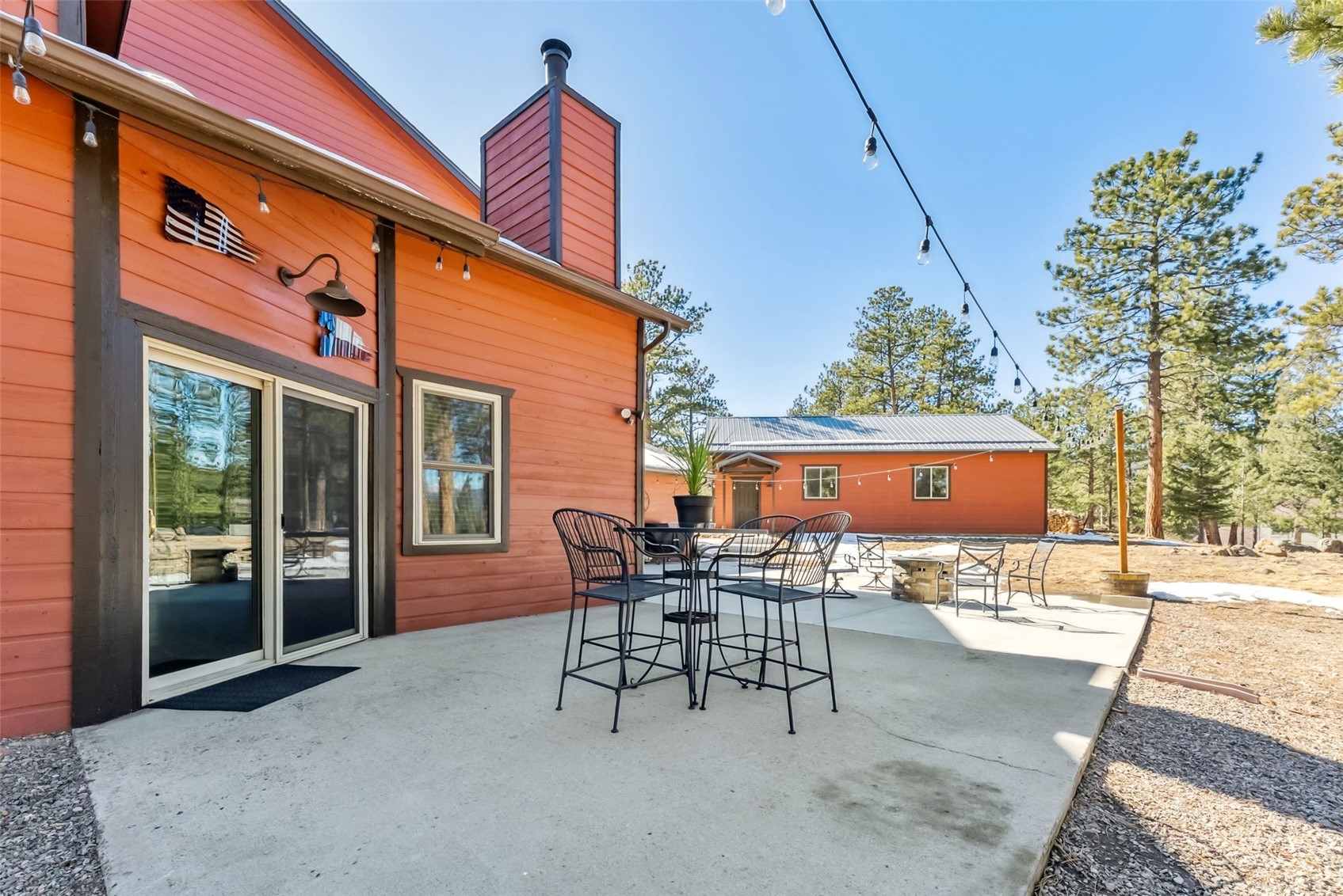 109 Old Corral Road Bailey, CO 80421 - Photo 41 of 50 View of patio with outdoor dining area