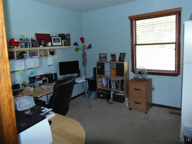 803 Copella Road Bath, PA 18014 - Photo 14 of 31 a view of a workspace with furniture and a window