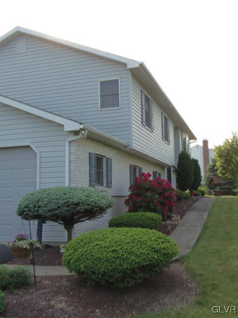 803 Copella Road Bath, PA 18014 - Photo 3 of 31 a front view of a house with garden