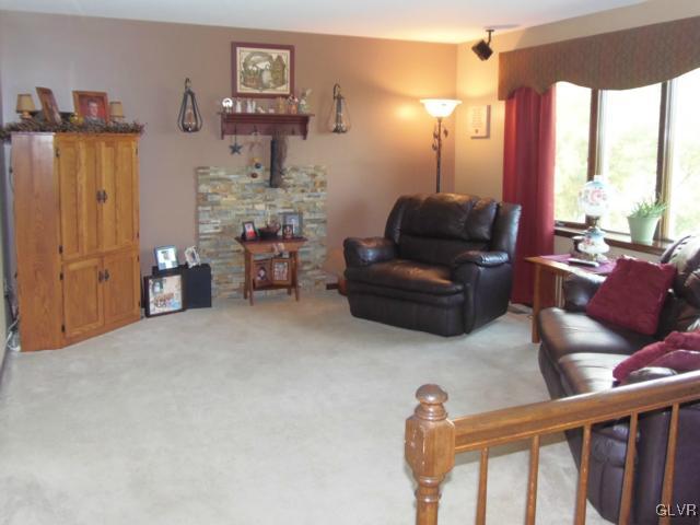 803 Copella Road Bath, PA 18014 - Photo 5 of 31 a living room with furniture and a lamp
